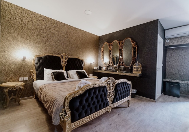 Imagen de la habitación del ROH Suites. Foto 15