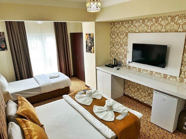 Imagen de la habitación del ROSE SUİT. Foto 12