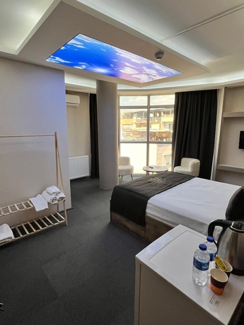 Imagen de la habitación del ROYAL İNN BORNOVA. Foto 6