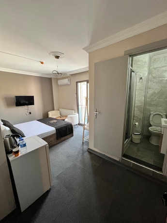 Imagen de la habitación del ROYAL İNN BORNOVA. Foto 7
