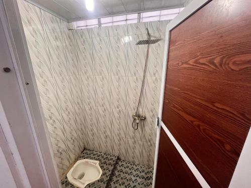 Imagen de la habitación del RUMAH 25 SYARIAH. Foto 18