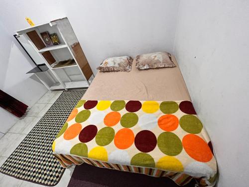 Imagen de la habitación del RUMAH 25 SYARIAH. Foto 19