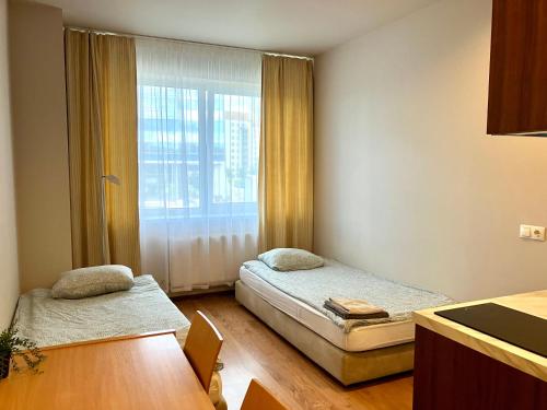 Imagen de la habitación del RVR Smart Apartments Riga with Self Check-in. Foto 13
