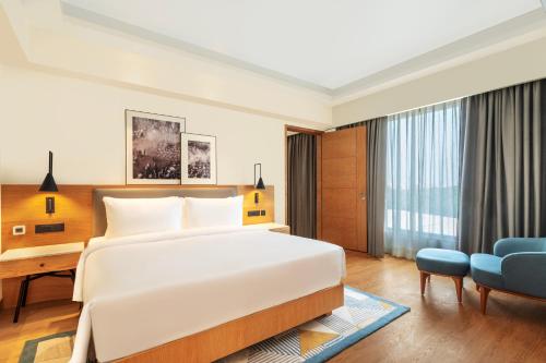 Imagen de la habitación del Radisson Hotel Vrindavan. Foto 9
