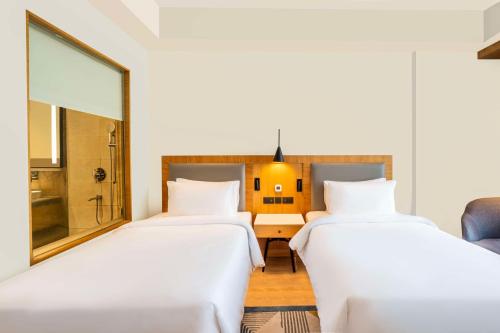 Imagen de la habitación del Radisson Hotel Vrindavan. Foto 15