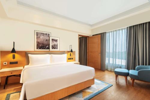 Imagen de la habitación del Radisson Hotel Vrindavan. Foto 19