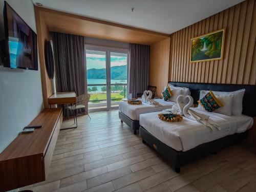 Imagen de la habitación del Raja Hotel Kuta Mandalika. Foto 18