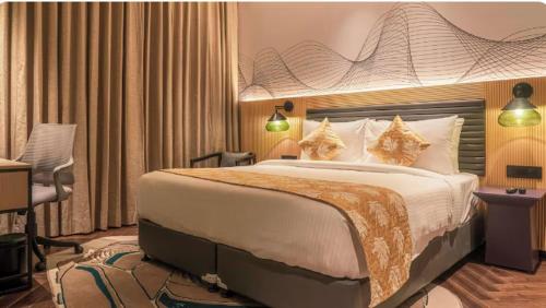 Imagen de la habitación del Ramada Encore By Wyndham Bhiwadi Phool Bagh Chowk. Foto 11