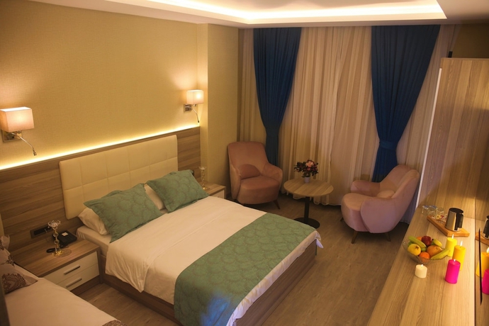Imagen de la habitación del Random Suit Otel. Foto 5