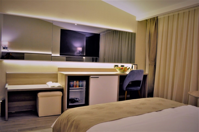 Imagen de la habitación del Random Suit Otel. Foto 11
