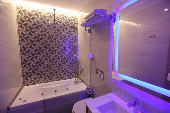 Imagen de la habitación del Random Suit Otel. Foto 18