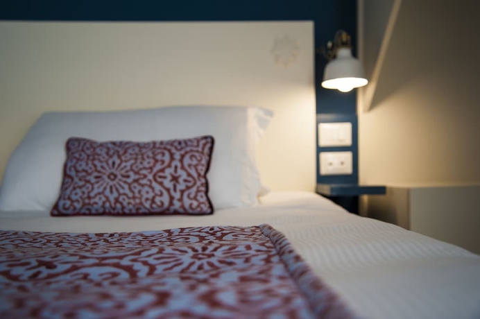 Imagen de la habitación del Rarity Suites. Foto 15