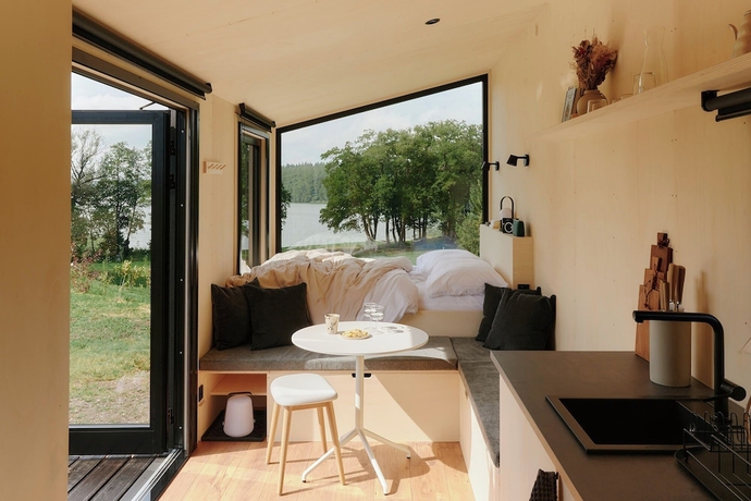 Imagen de la habitación del Raus | Cabins am See mit Sauna + Hot-Tub. Foto 9