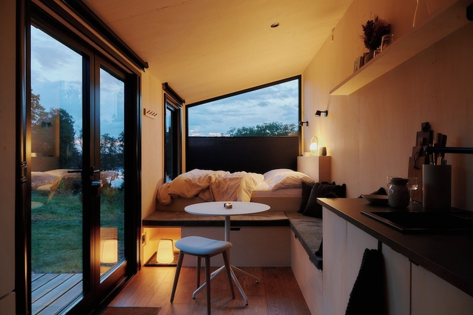 Imagen de la habitación del Raus | Cabins am See mit Sauna + Hot-Tub. Foto 11