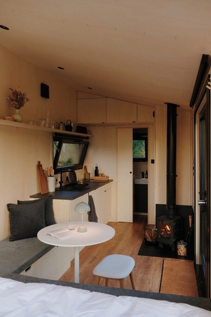 Imagen de la habitación del Raus | Cabins am See mit Sauna + Hot-Tub. Foto 12