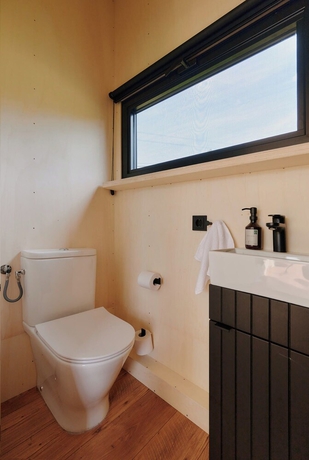 Imagen de la habitación del Raus | Cabins am See mit Sauna + Hot-Tub. Foto 14