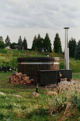 Imagen de la piscina del Raus | Cabins am See mit Sauna + Hot-Tub. Foto 16