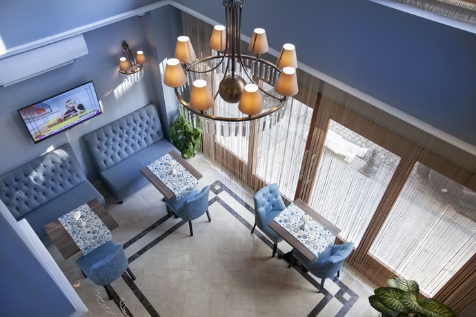 Imagen del bar/restaurante del Raymond Blue Hotel. Foto 3