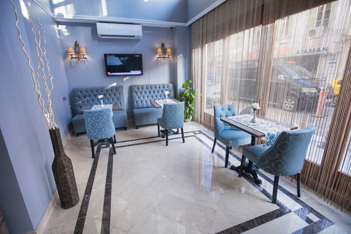 Imagen del bar/restaurante del Raymond Blue Hotel. Foto 4