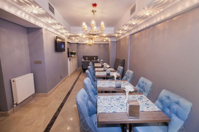 Imagen del bar/restaurante del Raymond Blue Hotel. Foto 6