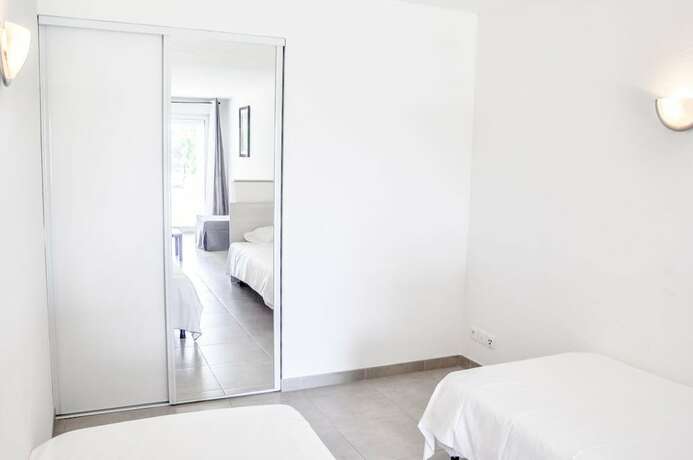 Imagen de la habitación del Résidence Pinarello. Foto 13