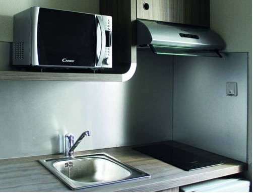 Imagen de la habitación del R&eacute;sidence Suiteasy Omega. Foto 2