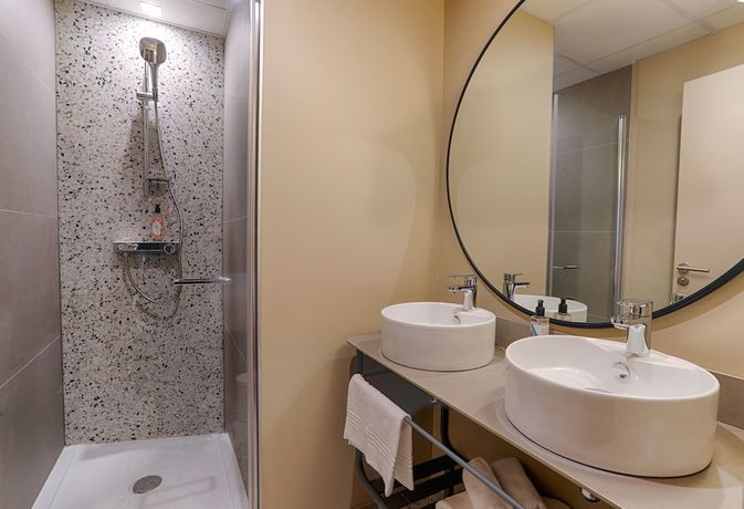 Imagen de la habitación del R&eacute;sidence meubl&eacute;e Bellini Vannes. Foto 7