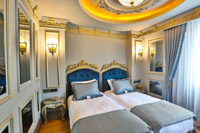 Imagen de la habitación del Real King Suit Otel. Foto 11