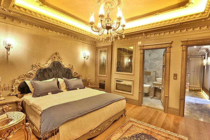 Imagen de la habitación del Real King Suit Otel. Foto 13