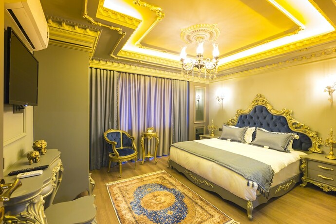 Imagen de la habitación del Real King Suit Otel. Foto 15