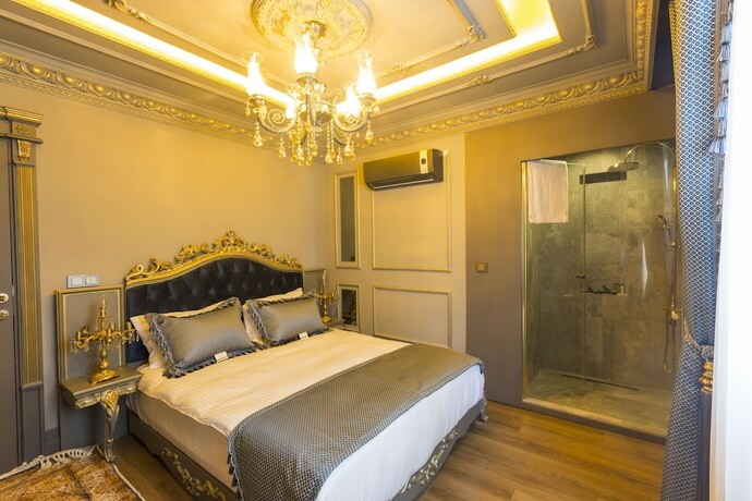 Imagen de la habitación del Real King Suit Otel. Foto 17