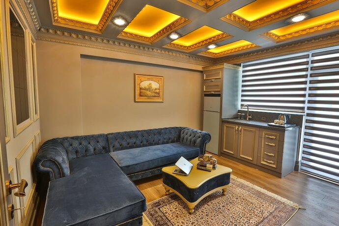 Imagen de la habitación del Real King Suit Otel. Foto 19
