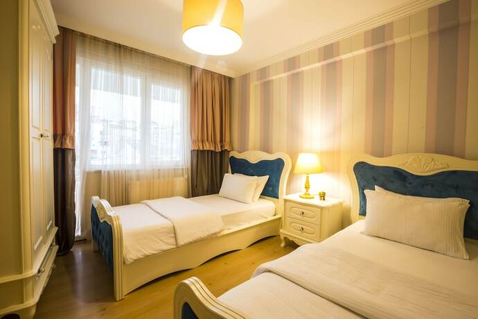 Imagen de la habitación del Real King Suit Otel. Foto 20