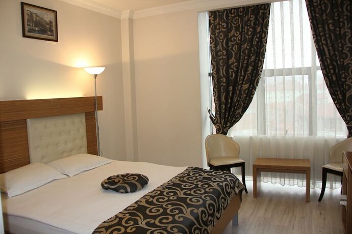 Imagen de la habitación del Real Residence. Foto 18