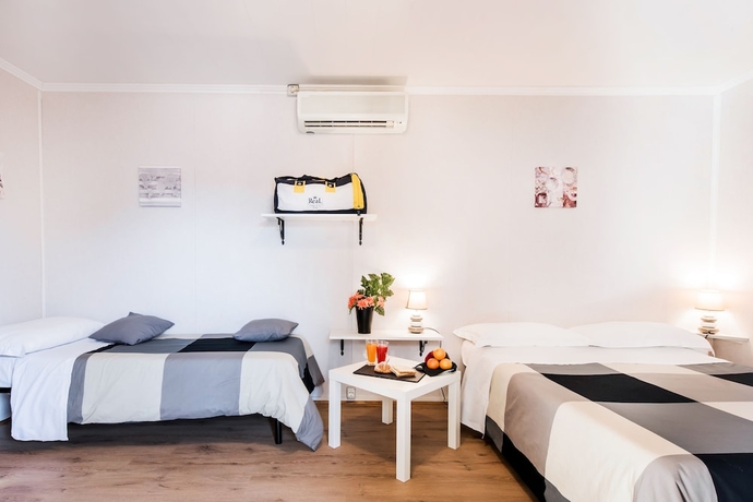 Imagen de la habitación del Real Village Roma. Foto 2