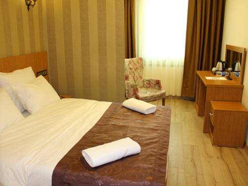 Imagen de la habitación del Realist Hotel. Foto 4