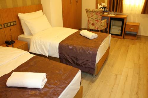 Imagen de la habitación del Realist Hotel. Foto 5