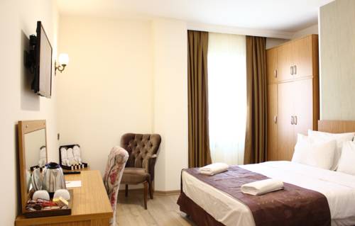 Imagen de la habitación del Realist Hotel. Foto 6