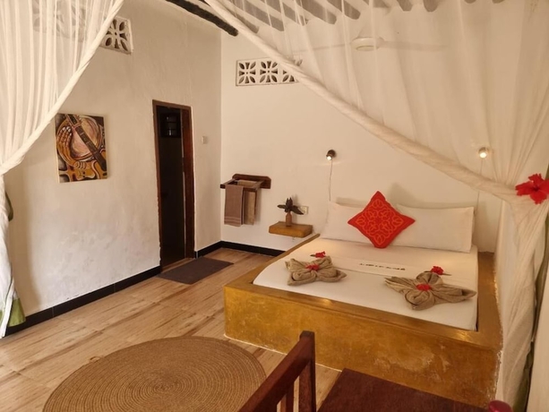 Imagen de la habitación del Red Monkey Beach Lodge. Foto 4
