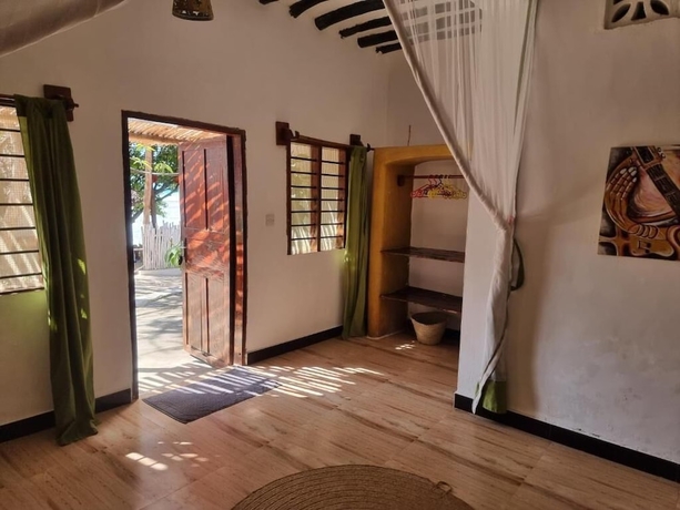 Imagen de la habitación del Red Monkey Beach Lodge. Foto 5