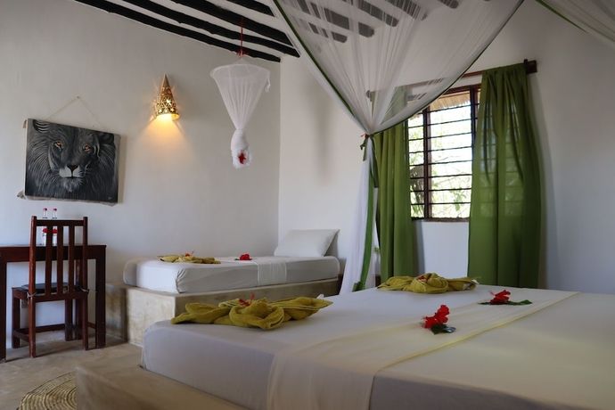 Imagen de la habitación del Red Monkey Beach Lodge. Foto 7