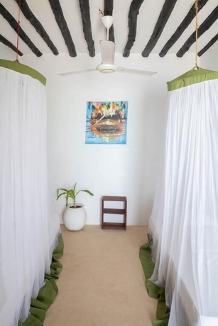Imagen de la habitación del Red Monkey Beach Lodge. Foto 9