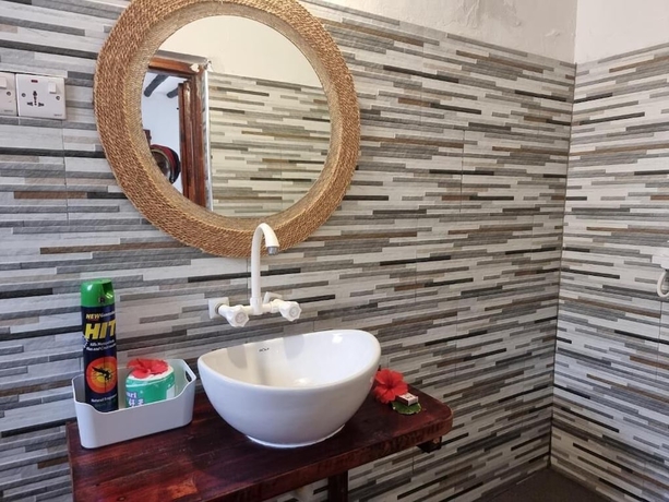 Imagen de la habitación del Red Monkey Beach Lodge. Foto 11