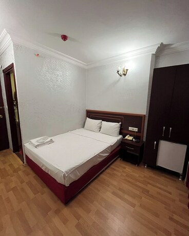 Imagen de la habitación del Red White Hotel. Foto 14