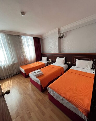 Imagen de la habitación del Red White Hotel. Foto 15