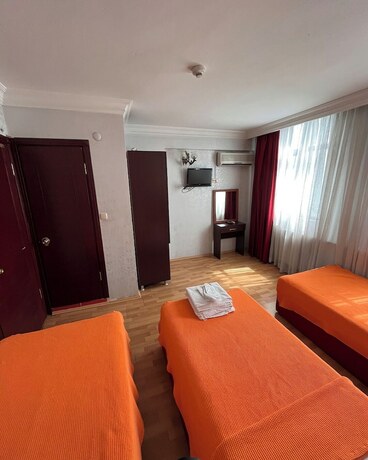 Imagen de la habitación del Red White Hotel. Foto 16