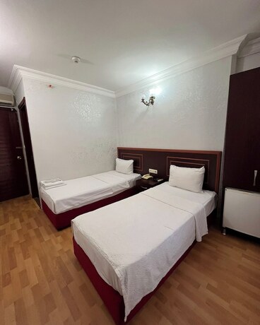 Imagen de la habitación del Red White Hotel. Foto 17