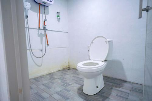 Imagen de la habitación del RedDoorz at Jalan Basuki Rahmat Lampung. Foto 20