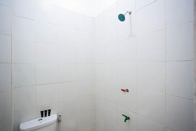 Imagen de la habitación del Reddoorz Plus Near Halim Perdanakusuma 2. Foto 8