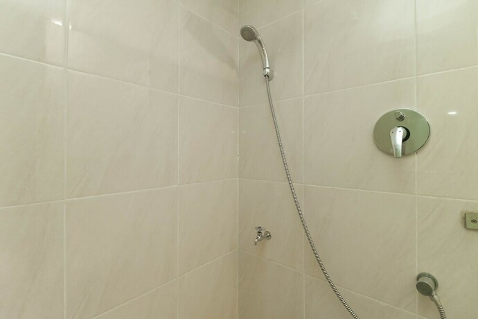Imagen de la habitación del Reddoorz Plus Near Halim Perdanakusuma 2. Foto 26